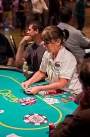 casino dealer preparing game